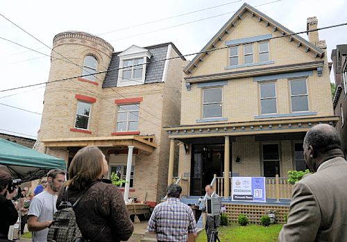 Allegheny County Chief Executive Dan Onorato speaks at a ribbon-cutting at 522 Jeannette St. in Wilkinsburg to celebrate the restoration of four homes in the Hamnett Place neighborhood. - Pam Panchak/Post-Gazette